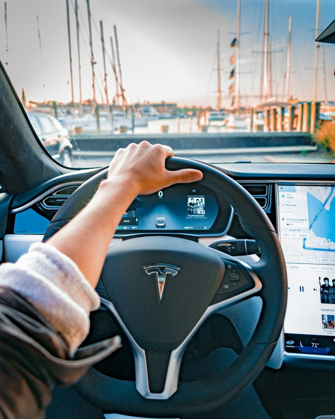 driver in electric luxury car