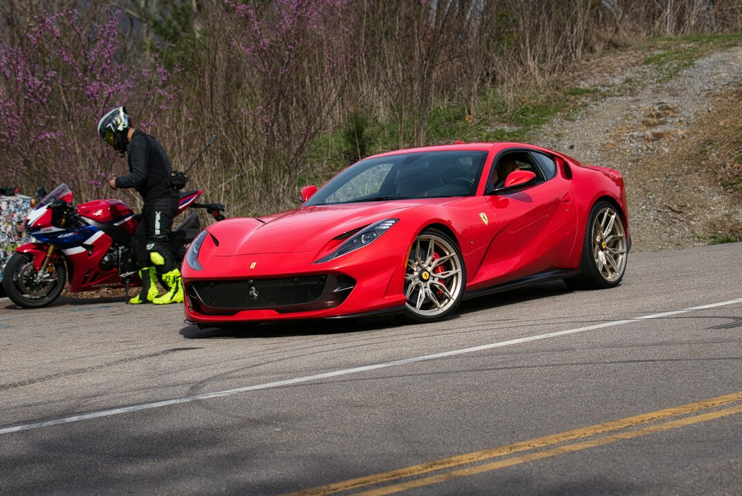 luxury sports car on mountain road